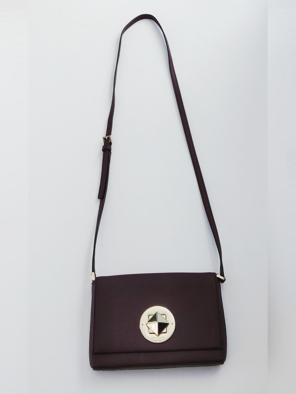 NWOT. Kate Spade Women’s Crossbody Bag in Dark Plum with Gold Accent.